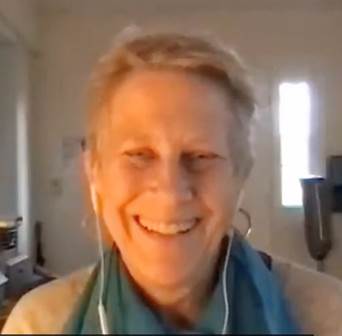 A person smiling for the camera
Description automatically generated with medium confidence