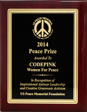 A plaque with a peace symbol

AI-generated content may be incorrect.